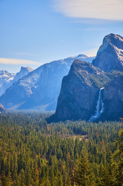 Soft morning light over Yosemite Valley at Bridalveil Falls with Half Dome in distance