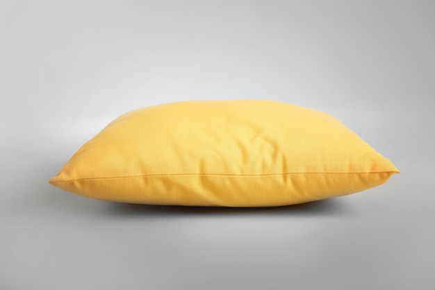 Soft pillow on light background