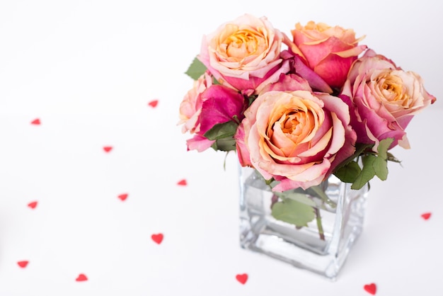 Soft pink roses and heart shape ornaments