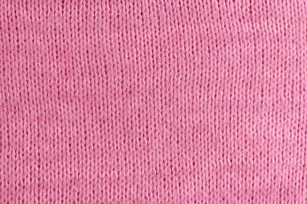 Soft pink woolen knitted textured cloth background mockup copy space