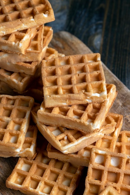 Soft sweet waffles on the table close up