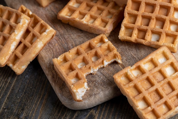 Soft sweet waffles on the table close up