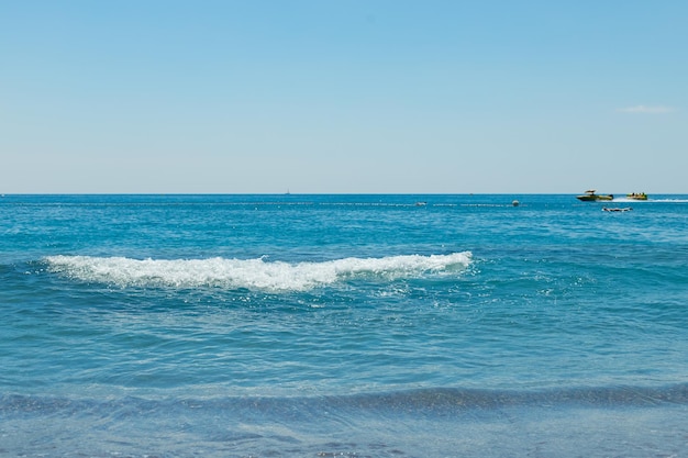 Soft wave of the turquoise sea natural summer background with copy spaceazure wavessummer seascapefa