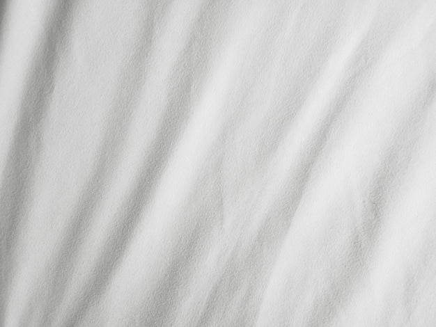 Soft white wrinkled fabric background