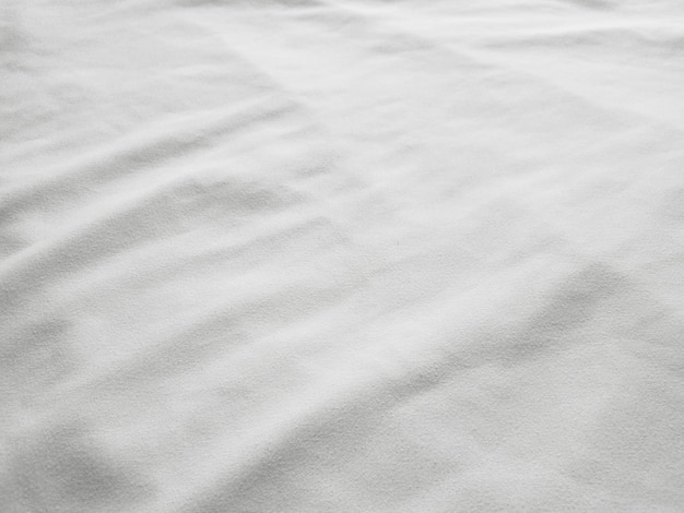 Soft white wrinkled fabric background