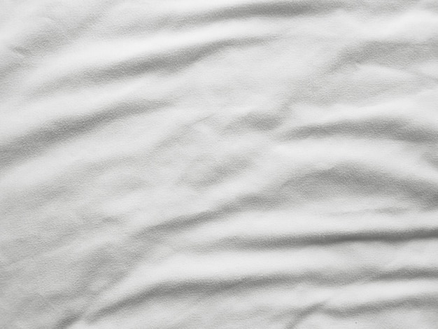 Soft white wrinkled fabric background