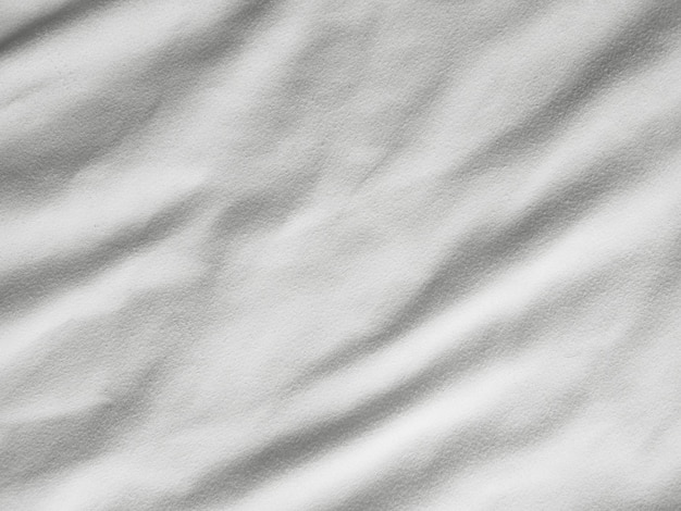 Soft white wrinkled fabric background