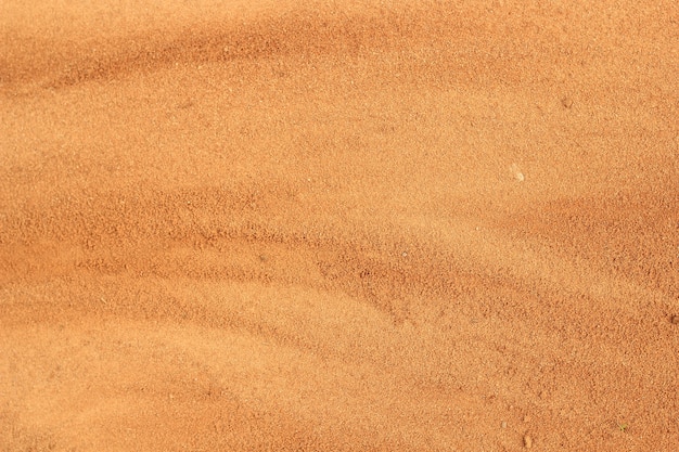 Soil background. Red sand.