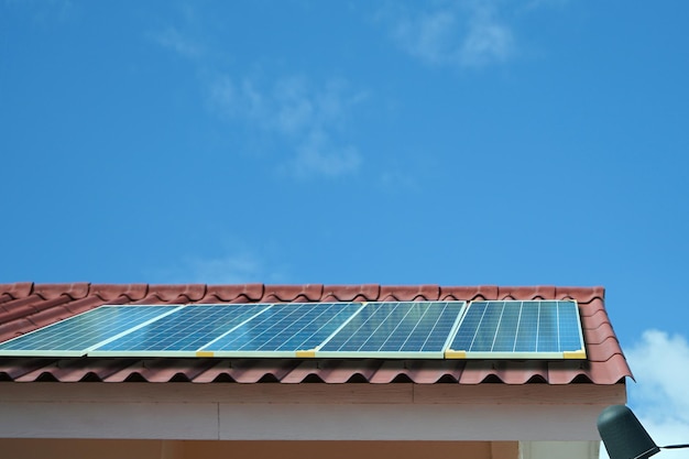 solar cells panel installed on the roof of a large building are full of dirt and dust