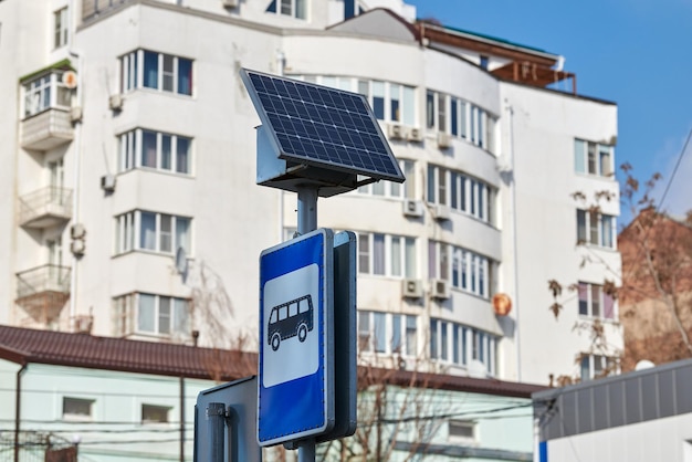 Solar panel on city road sign post power for bus stop light environmental friendly electricity