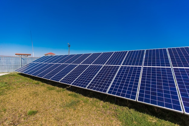 Solar Panels Against The Deep Blue Sky