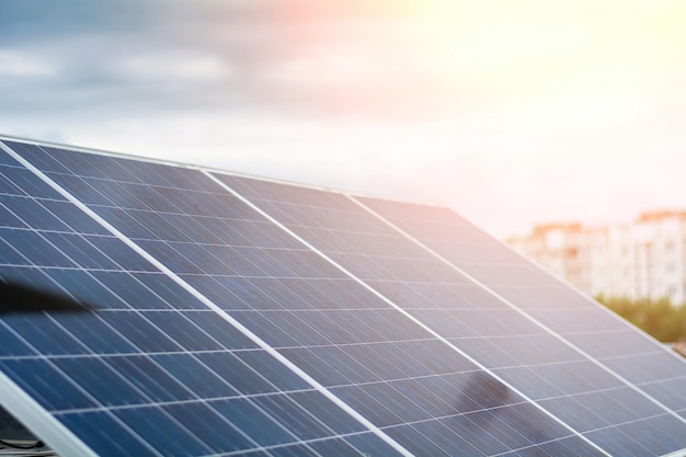 Solar panels on the roof of a house in the city Concept of ecological electricity