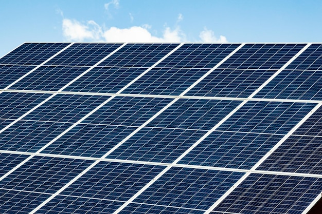 Solar panels on the roof of a house closeup The solar panels are stacked close to each other