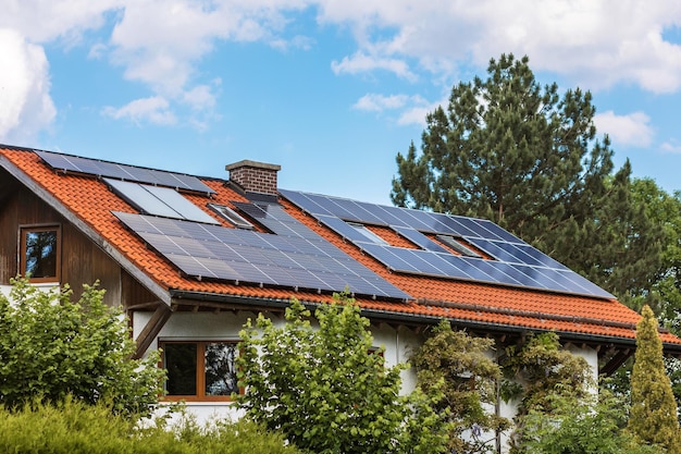 Solar Panels on Roof of Private House Modern Eco House with Solar System on Roof