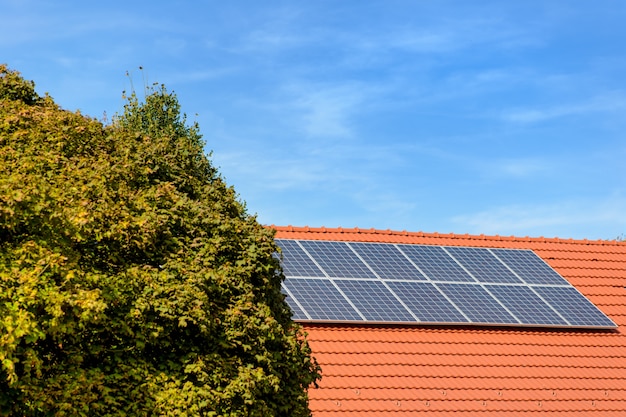 Solar panels at the top of a family house.