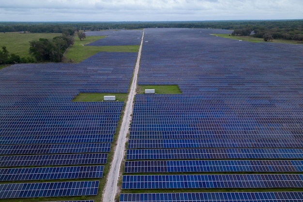 Solar panels with sunny sky Blue solar panels background of photovoltaic modules renewable energy