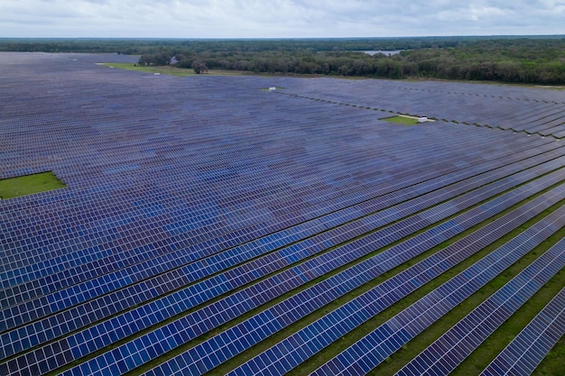 Solar panels with sunny sky Blue solar panels background of photovoltaic modules renewable energy