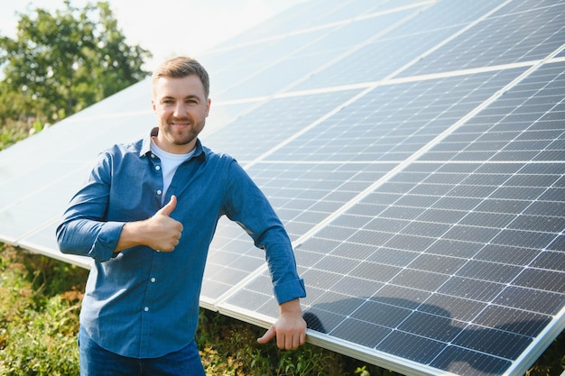 Solar power plant Engineer on a background of photovoltaic panels Science solar energy