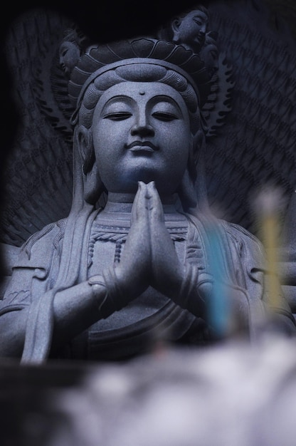 Solemn buddha stone carving art