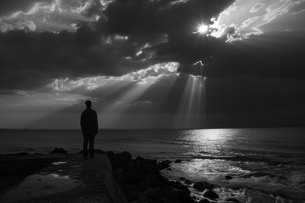 Photo solitary silhouette against ocean vista bathed in sunlight