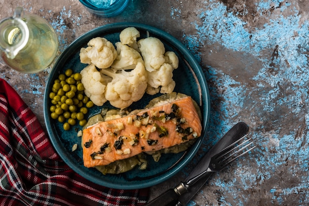 Solomon fillet with pineapple and cauliflower. Fish with vegetables.