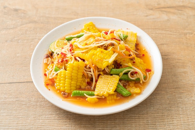 Som Tum - Thai spicy papaya salad with corn - Asian food style