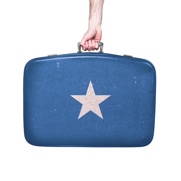 Somalia flag on a vintage leather suitcase