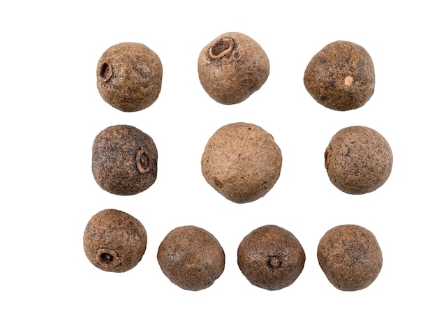 Some black peppercorns isolated on white background with copy space for text or images spices and he