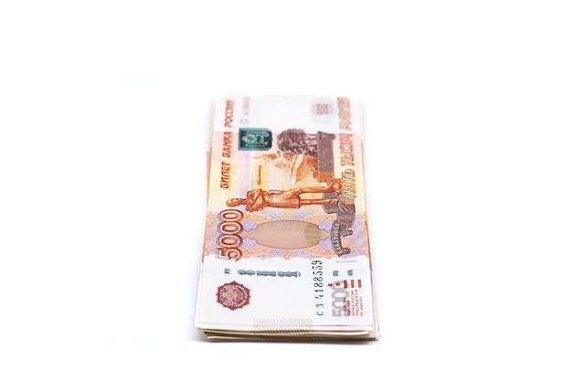 Some five thousand rubles bills Stack of Russian cash on white