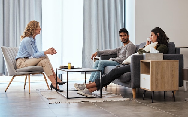 Some illnesses require an extra dose of help Shot of a couple having an argument during a counseling session with a therapist