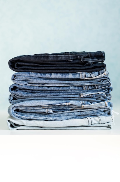 Some stacked blue jeans close up Denim collection