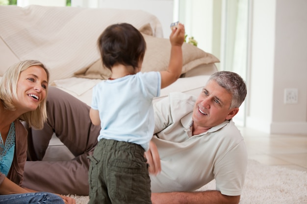 Son playing with his parents 