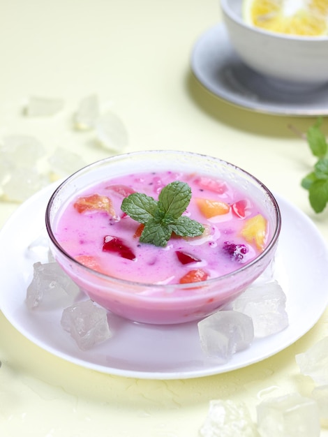 Sop Buah or Es Buah is Mixed Fruit with Coconut or Simple Syrup, Served with Shaved Ice