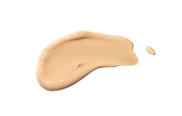 Sorrecting smear of concealer isolated on a white background