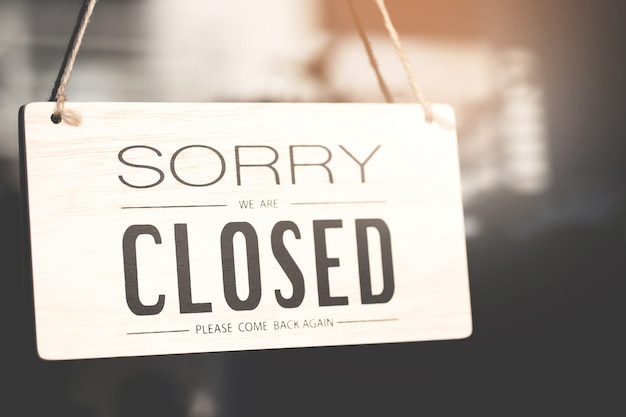 Sorry we are closed sign on shop door