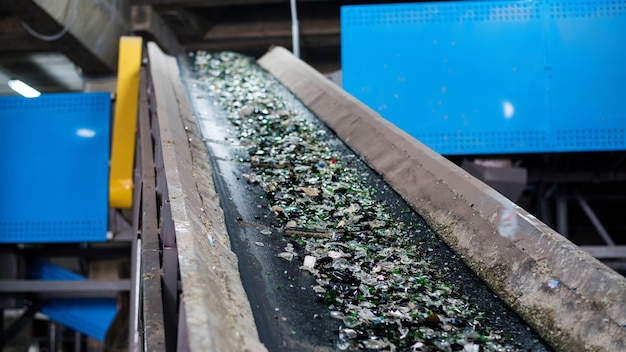 Sorting glass garbage at waste sorting plant