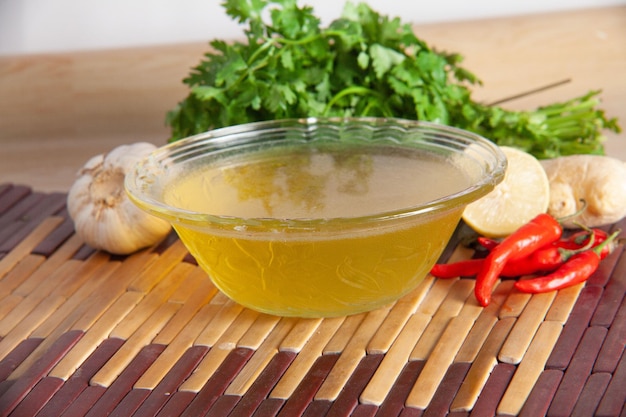 Soup bowl with red chilli garlic ginger and coriander