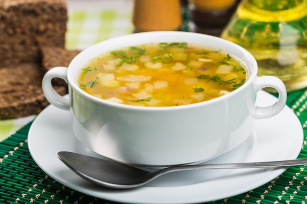 Soup chicken bowl hot plate white peas