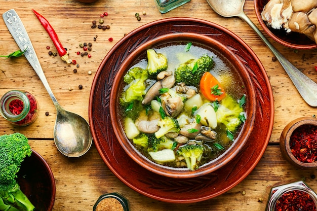 Soup with broccoli and mushrooms