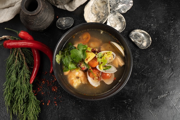 Soup with shrimp, seafood and vegetables