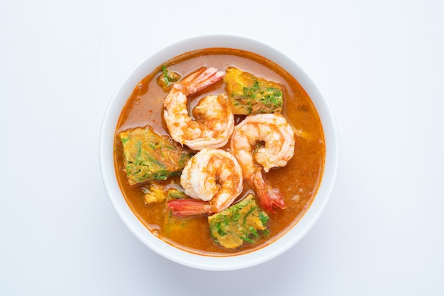 Sour soup made of Tamarind Paste with Shrimps and Vegetable Omelet - Asian food style or Thai food style isolated