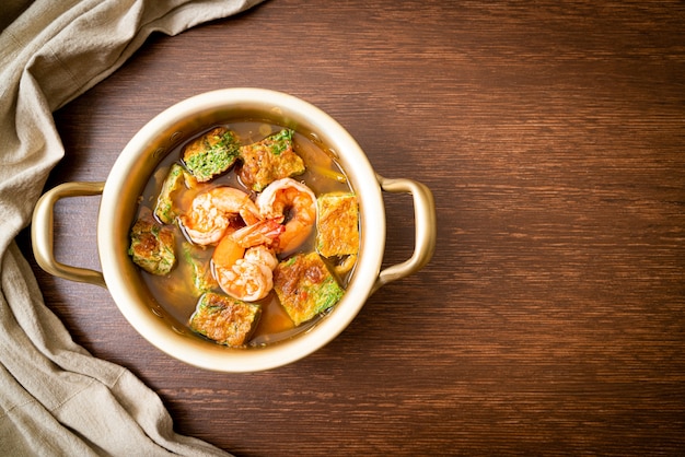 Sour soup made of Tamarind Paste with Shrimps and Vegetable Omelet - Asian food style