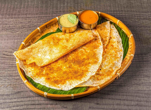 South Indian vegetarian breakfast idli karam podi dosa sambar chutney top view