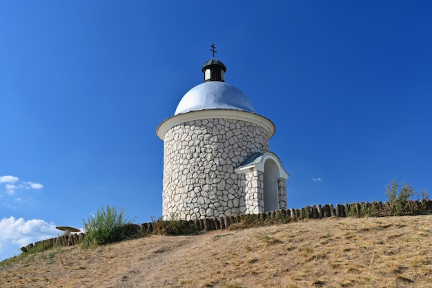 South Moravia wine region A beautiful little chapel above the vineyards Summer landscape with nature in the Czech Republic Hradistek Velke Bilovice