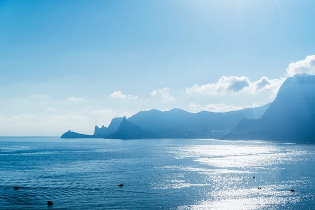 South sea coast on a bright summer sunny day, blue toning