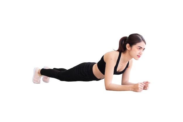 Southeast Asian woman wearing black workout clothes doing planks and white background