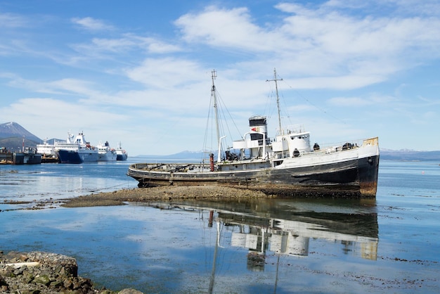 Southernmost city in the world Beached ship on Ushuaia port Argentina landscape