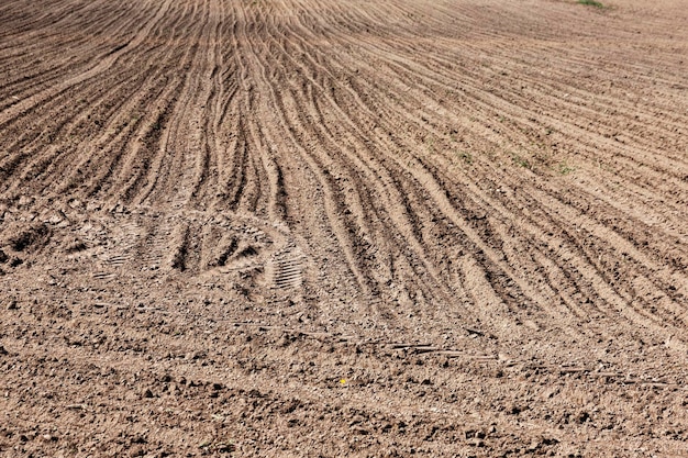 Sowing time plowed land rows of plowed land prepared for sowing