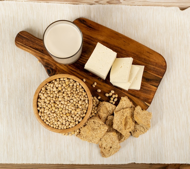 Photo soy foods collection with soy products mix, soya milk, bean curd, soy protein or tsp