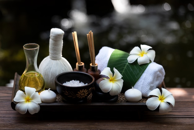 Spa beauty massage health wellness background. Spa Thai therapy treatment aromatherapy for body woman with flower nature candle for relax and summer time,